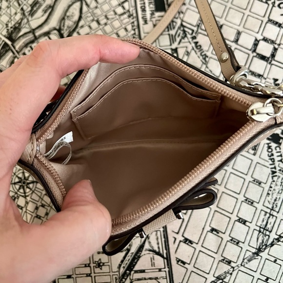 Coach Wristlet with bow Color: Sand/tan 6.25"W x 4.25"H x .25 D - Picture 4 of 6